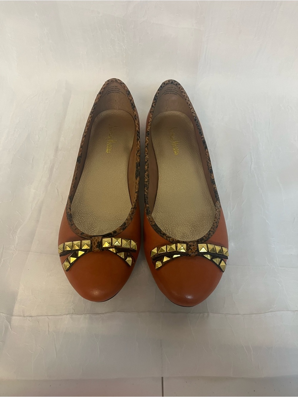 Neiman Marcus Burnt Orange Leather Ballet Flats with Gold Stud Bow